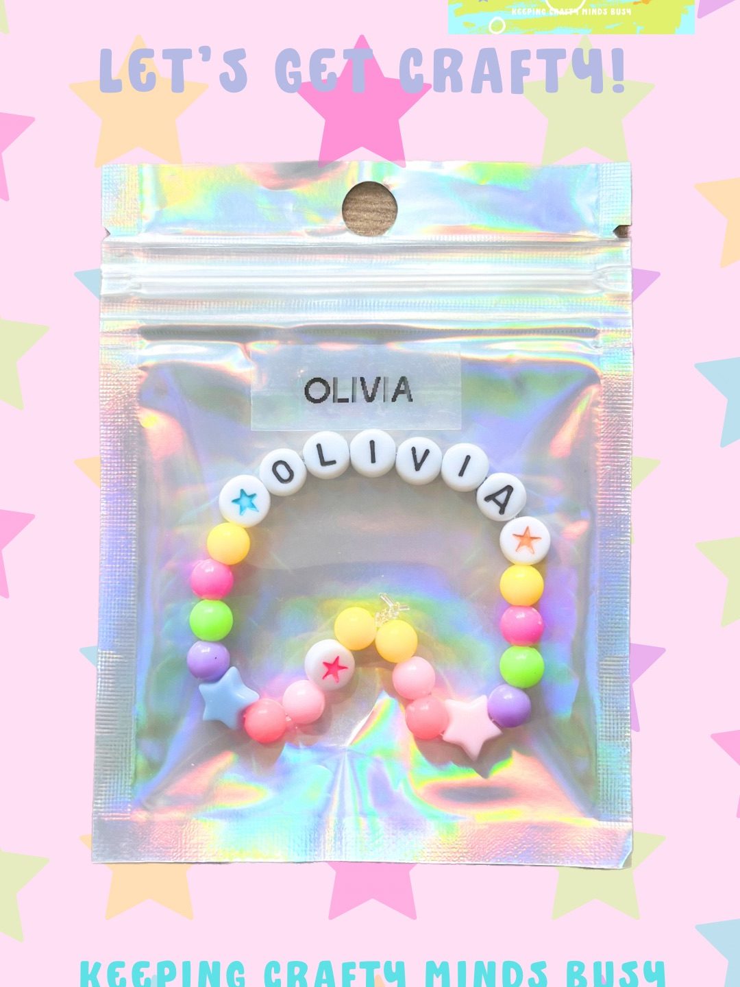 See through rectangle bag. On bag is printed name Olivia. Inside brightly coloured beads on a bracelet. 
