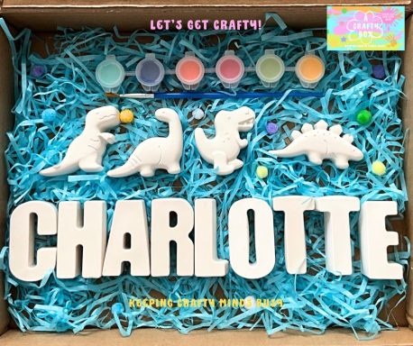 Four plaster of Paris dinosaurs. Six paints in various colours and a paintbrush. Plaster of Paris letters spelling Charlotte.